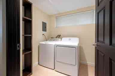 Orchid I washer and dryer area