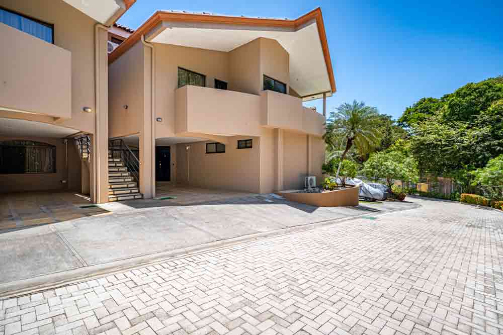 Orchid III exterior and parking area